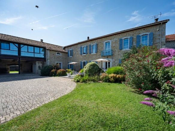 Built bed and breakfast with lush gardens in Ausson, Haute Garonne, perfect for a luxury lifestyle.