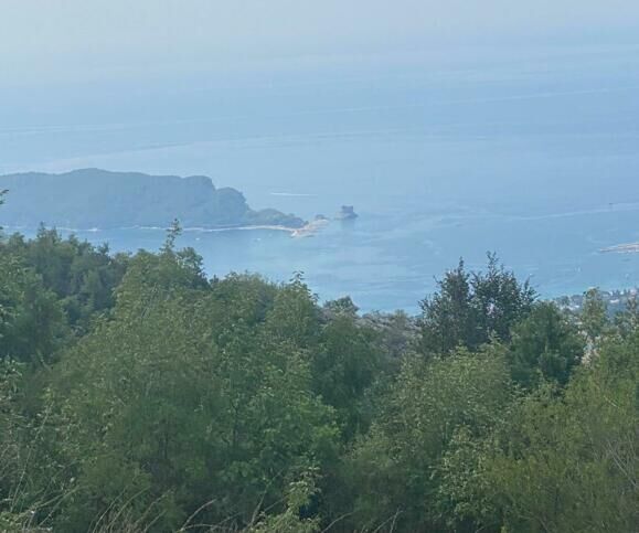 Land for sale in Budva, Montenegro, offering stunning panoramic views of the Adriatic Sea and surrou.