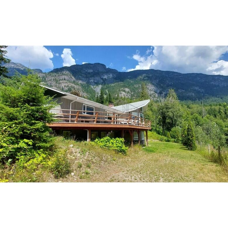 Beautiful 4-bedroom estate for sale in Bella Coola, British Columbia, with mountain views and lush s.