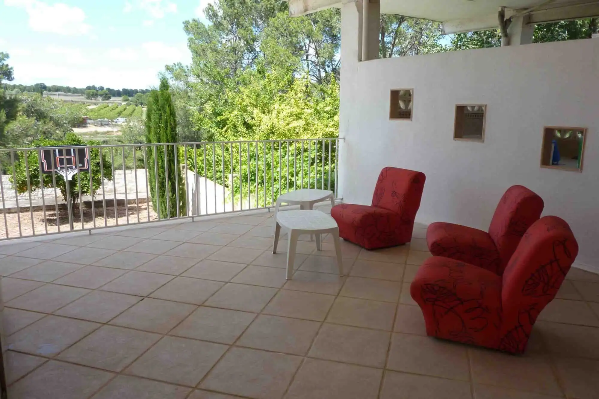 Spacious outdoor terrace of a luxurious 6-bedroom villa in Valencia, perfect for relaxing and enjoyi.