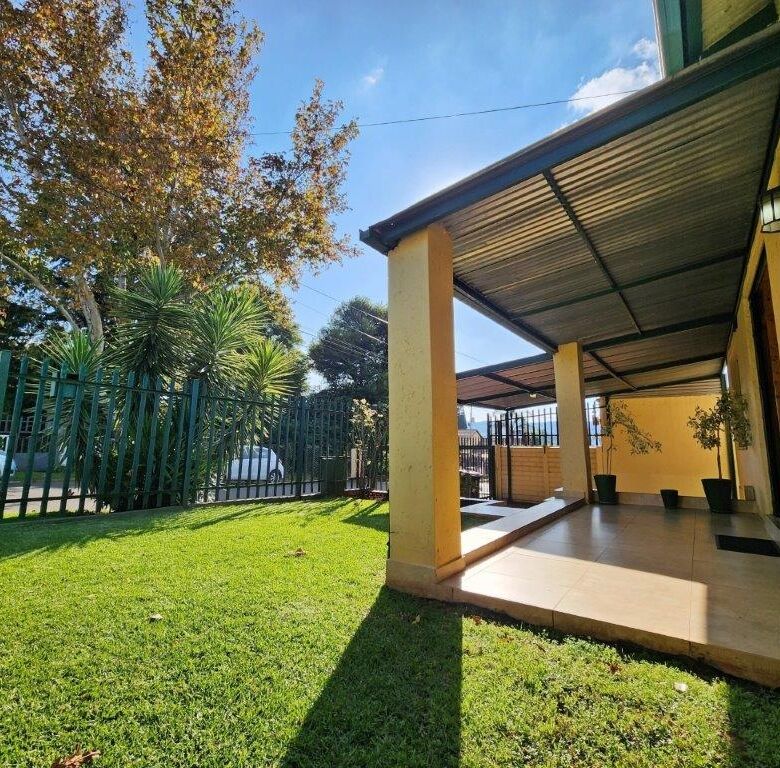 Spacious 4-bedroom house with a covered patio in Albertville, Johannesburg South.