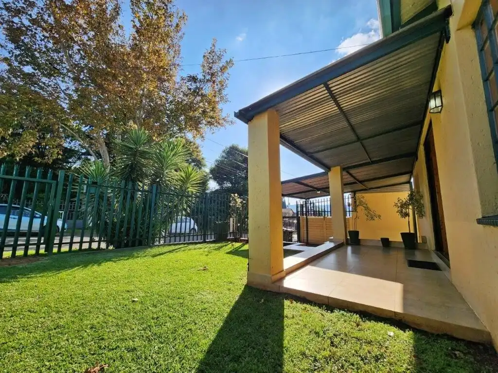 Spacious 4-bedroom house with a covered patio in Albertville, Johannesburg South.