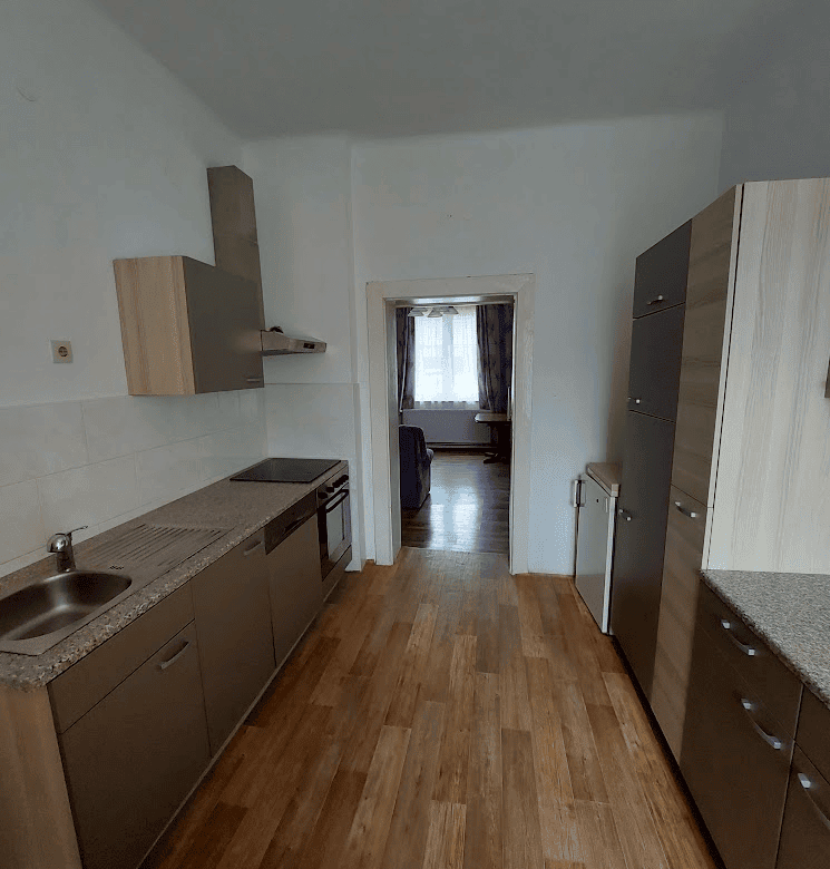 Apartment kitchen in Wilhelmsburg property listing.