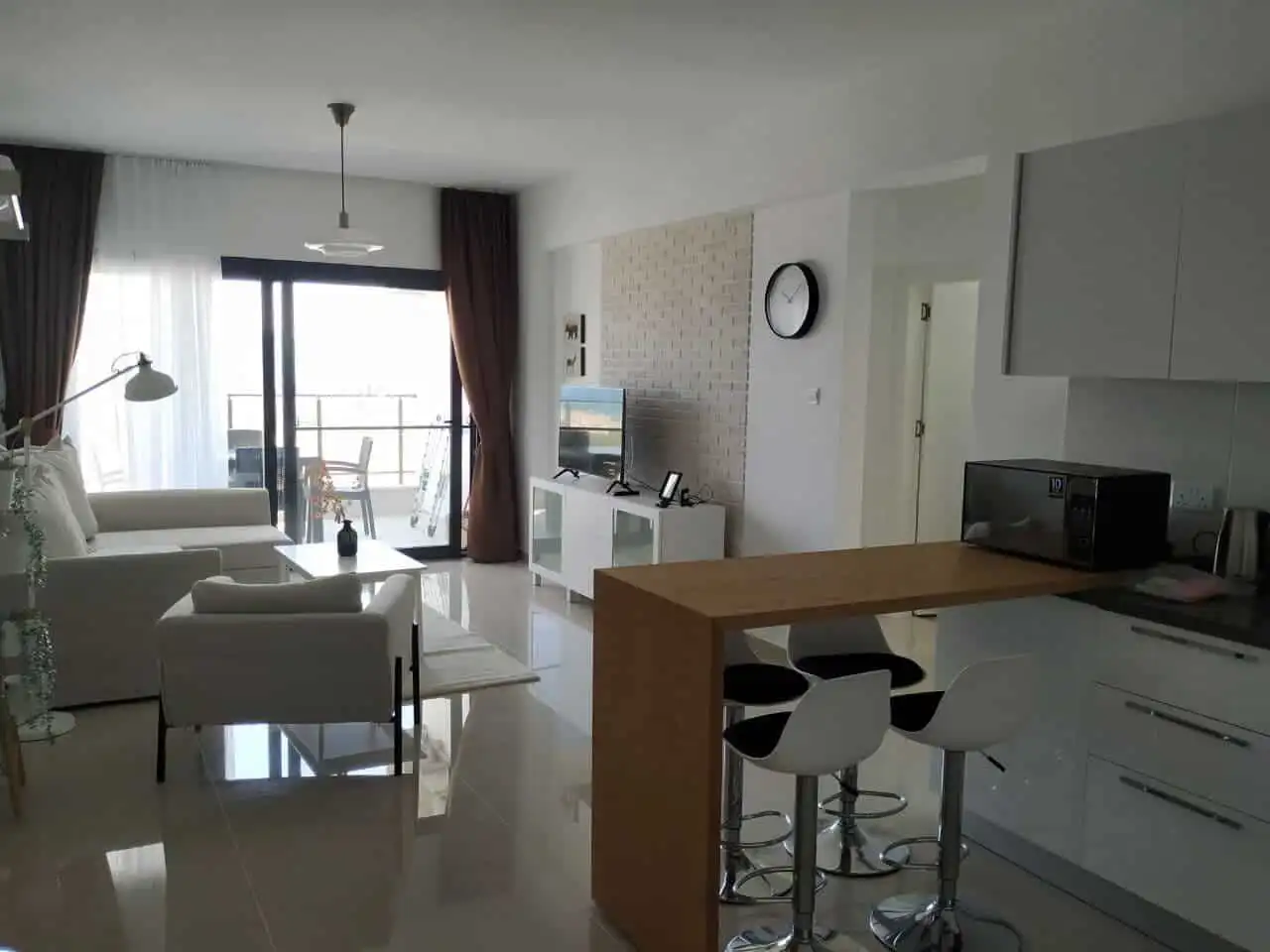 Modern 2-bedroom apartment with spacious living area and balcony in Caeser’s Resort North. Perfect f.