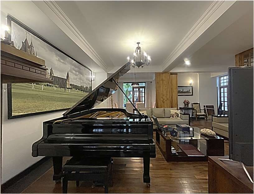 Elegant Colombo home with grand piano and stylish interior.