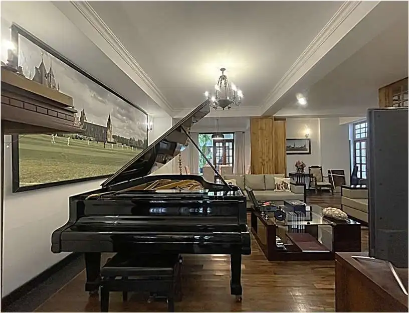 Elegant Colombo home with grand piano and stylish interior.