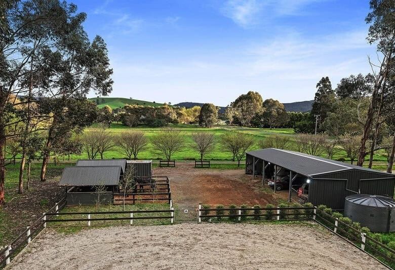 Elegant 6-bed equestrian property for sale in Flowerdale Victoria with stables and scenic countrysid.