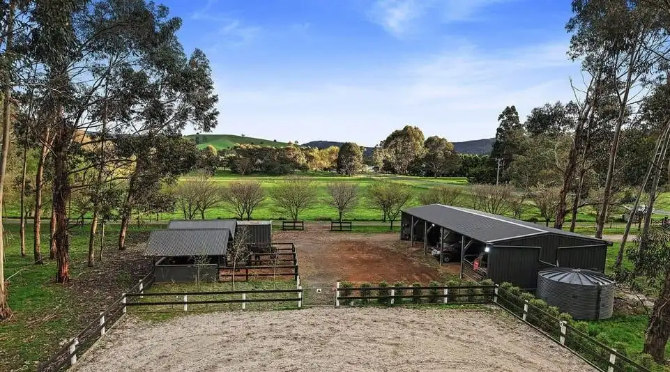 Elegant 6-bed equestrian property for sale in Flowerdale Victoria with stables and scenic countrysid.