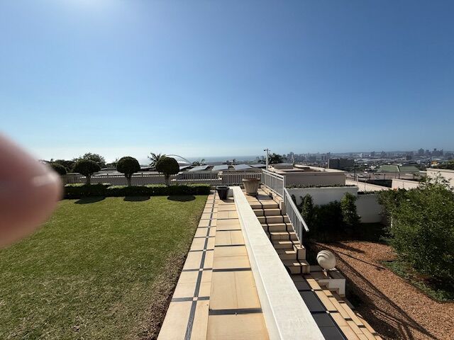 Luxury 5-bedroom villa with panoramic city and ocean views in Durban South. Perfect for upscale livi.