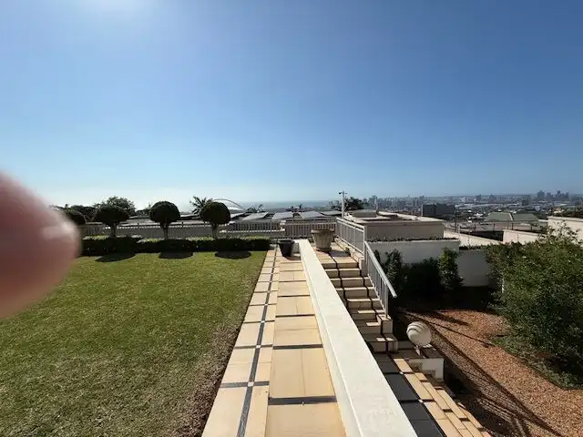 Luxury 5-bedroom villa with panoramic city and ocean views in Durban South. Perfect for upscale livi.