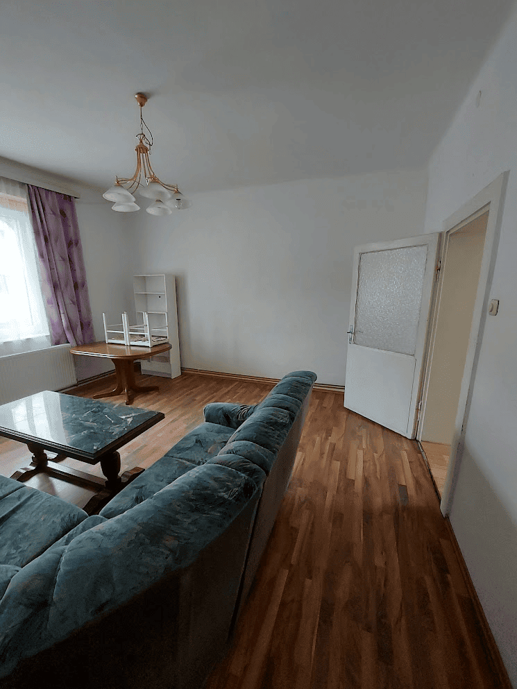 Building with 4 Apartments for Sale in Wilhelmsburg Apartment interior with living room and furniture in Wilhelmsburg.