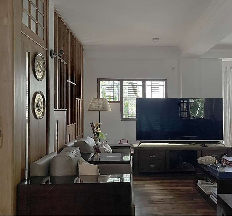 Elegant living room with modern furniture and wooden accents in Colombo, Sri Lanka.