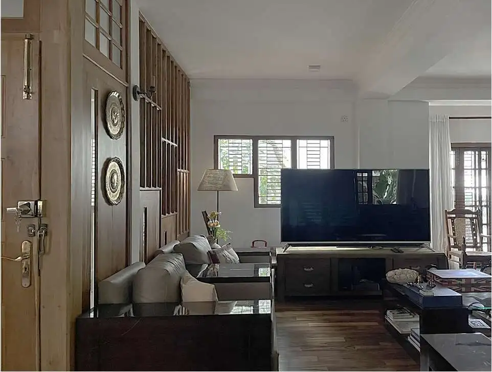 Elegant living room with modern furniture and wooden accents in Colombo, Sri Lanka.