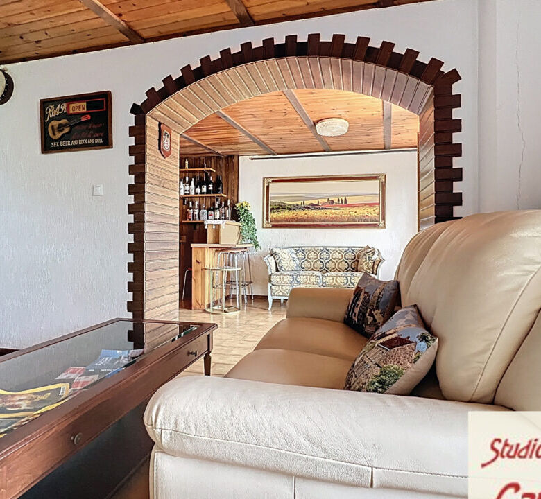 Cozy living room in a 4-bed house for sale in Fivizzano, Tuscany.