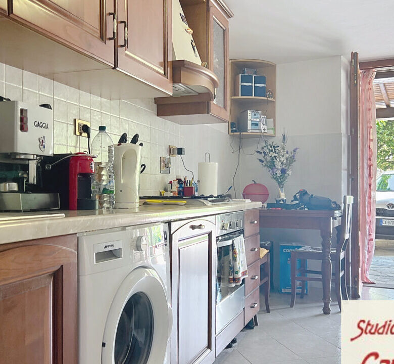 Beautiful interior of a 4-bedroom house for sale in Fivizzano, Tuscany, featuring a cozy kitchen and.
