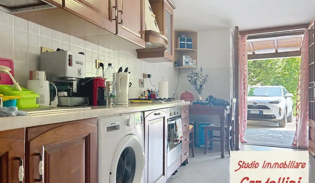 Beautiful interior of a 4-bedroom house for sale in Fivizzano, Tuscany, featuring a cozy kitchen and.