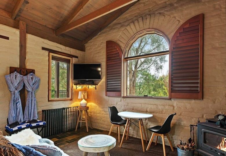 Elegant interior of a luxury 6-bedroom equestrian estate in Flowerdale, Victoria, featuring rustic w.