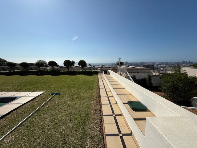 Elegant villa with spacious outdoor terrace and ocean views in Durban, South Africa. Perfect for lux.