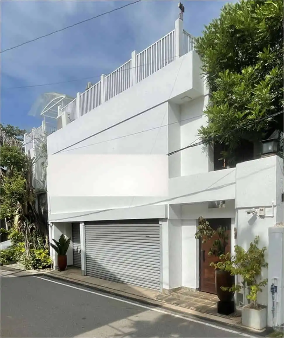 Modern white house with rooftop terrace in Colombo, Sri Lanka.