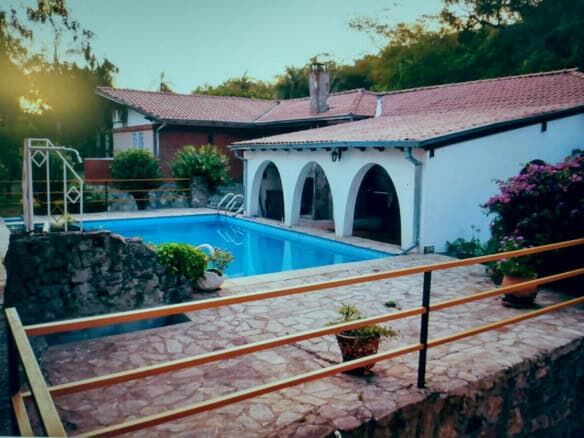 Beautiful property featuring two houses and a swimming pool in Pirayu, Paraguay. Ideal for family li.