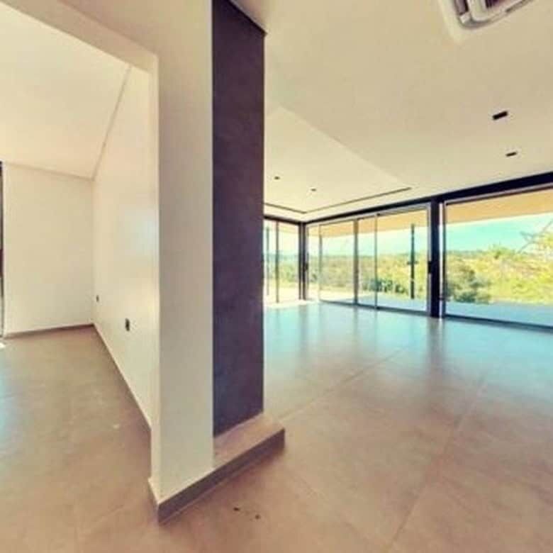 Luxury vacation villa with pool in Paraguay, modern design, spacious interiors, and panoramic views.