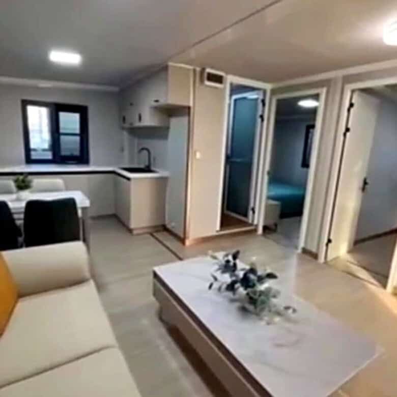 Cozy living space with open-plan kitchen and comfortable seating area.