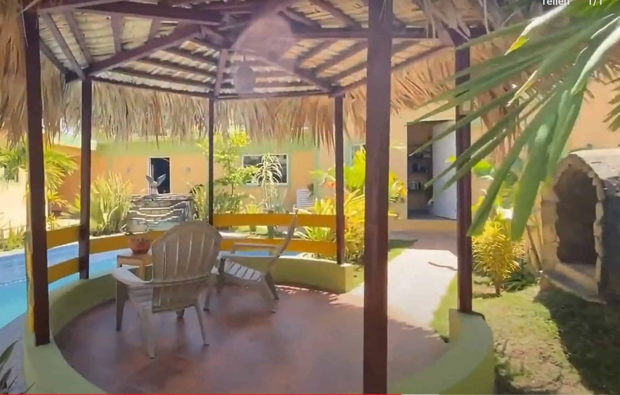 Tropical garden gazebo with seating area in the Dominican Republic. Perfect for relaxing and enjoyin.