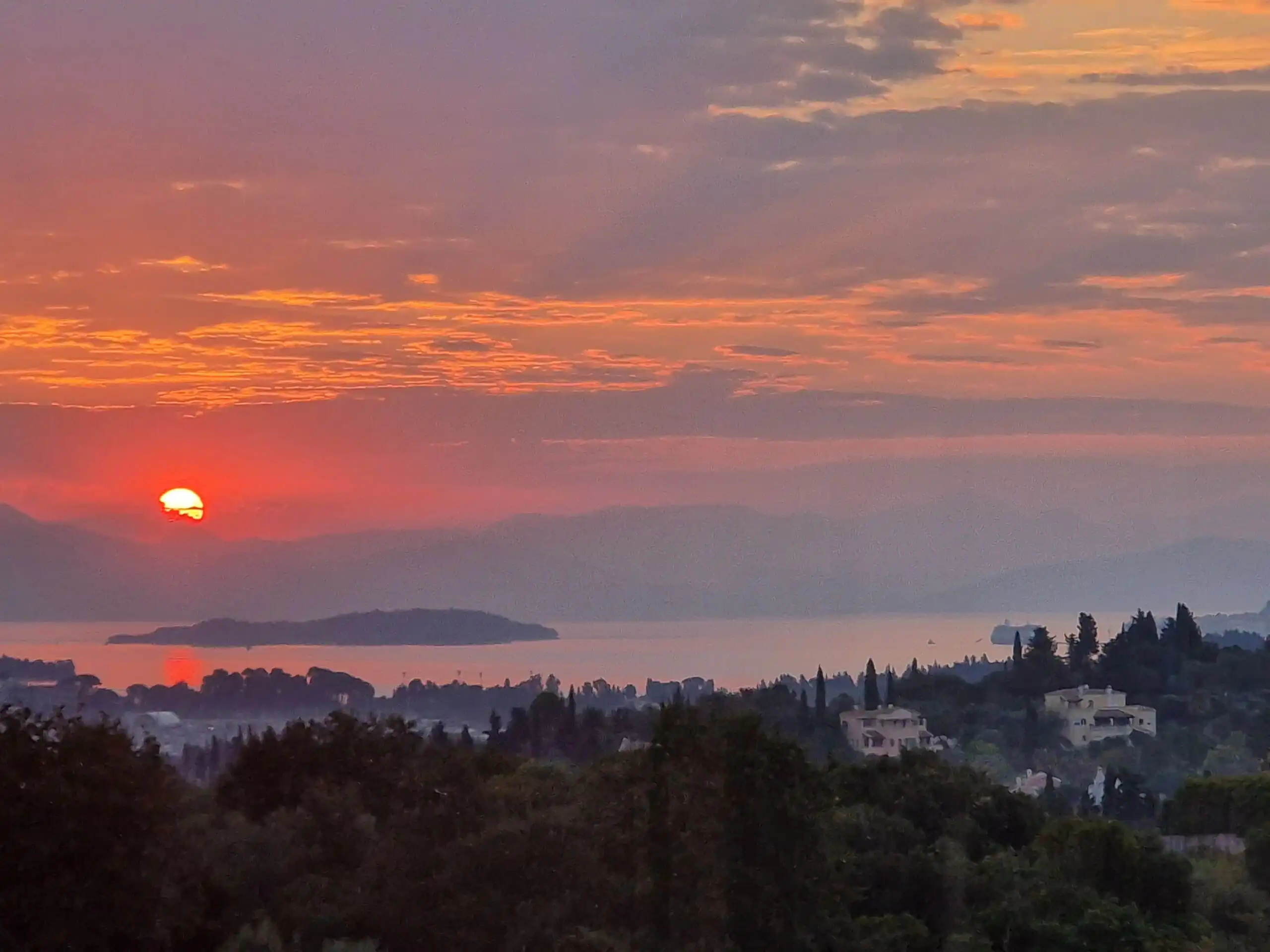 View villa in Gouvia, Corfu, during sunset. Fully renovated with stunning views of the Ionian Sea an.