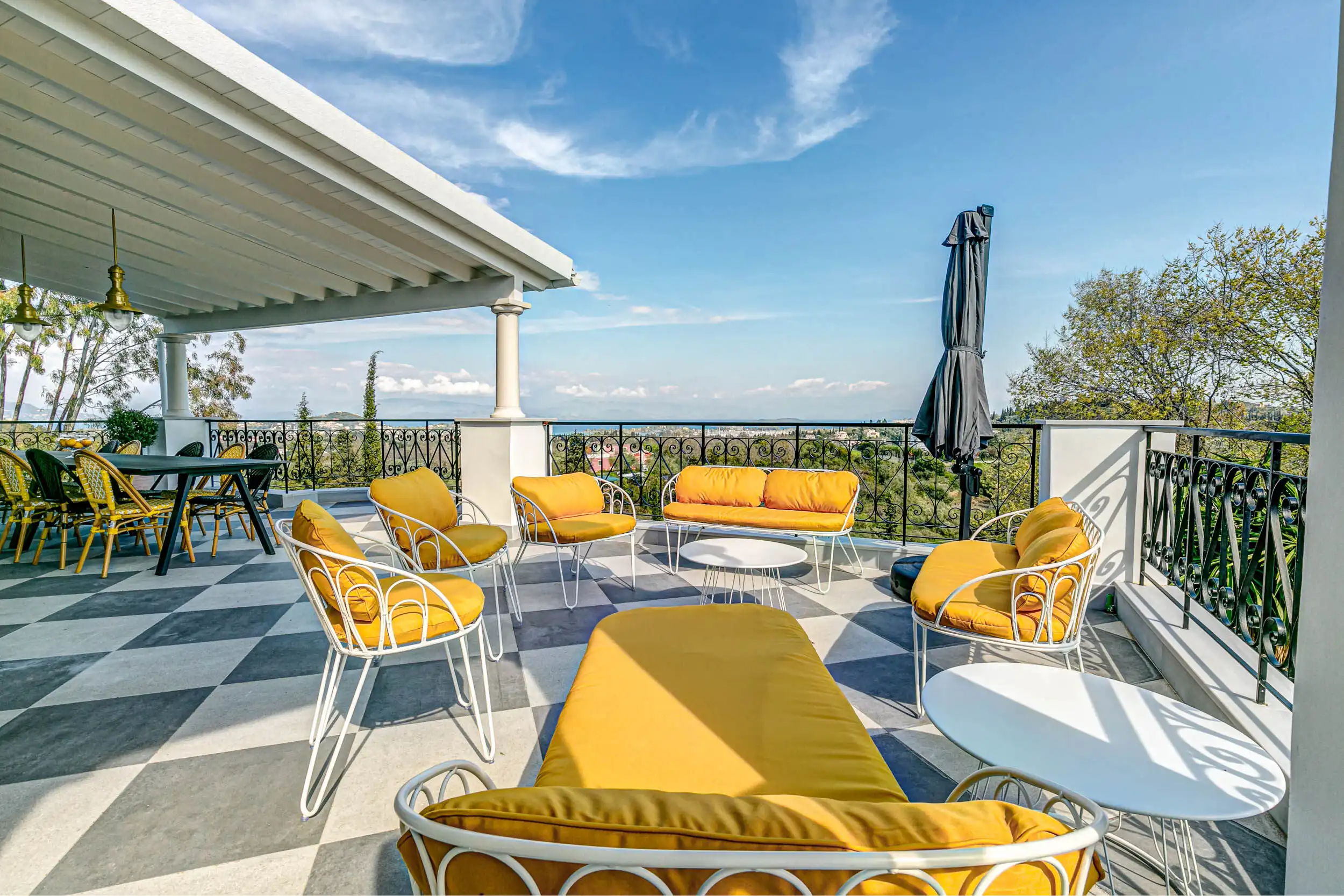 Luxury Villa Sea-View Terrace View terrace of luxury villa in Gouvia, Corfu with stylish outdoor seating.