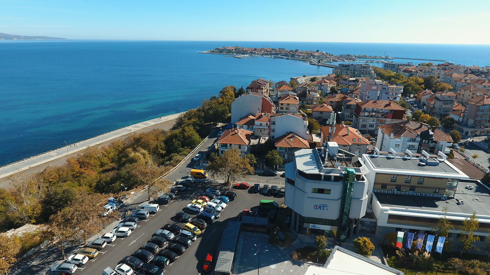 Modern PrimeSat building complex overlooking Nessebar coast and sea.