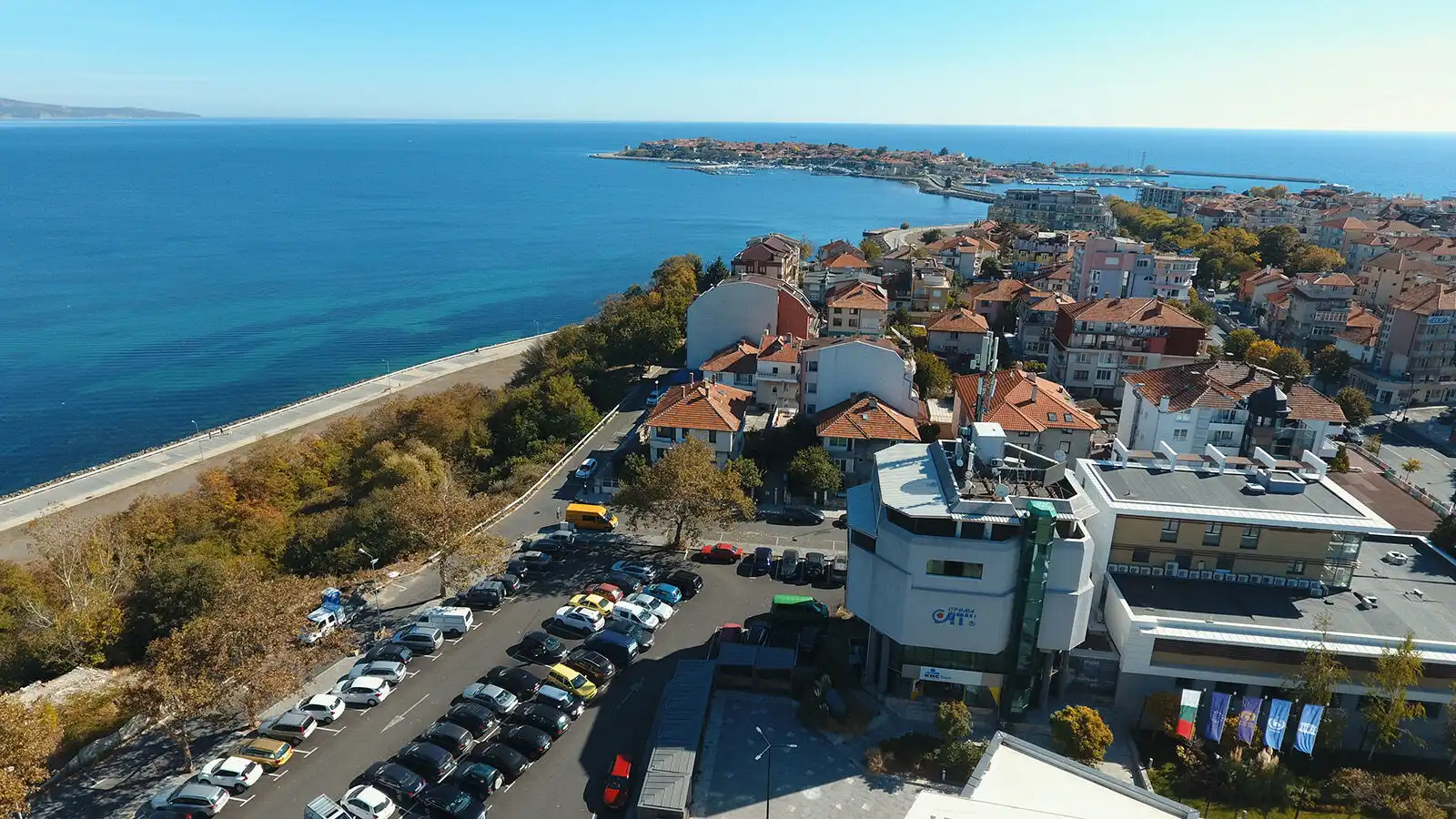 Modern PrimeSat building complex overlooking Nessebar coast and sea.