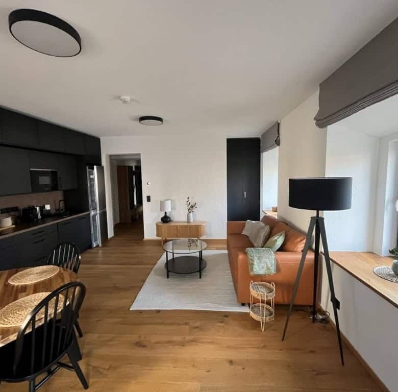 Modern interior of a luxury apartment in Rattendorf with stylish furnishings and spacious living are.