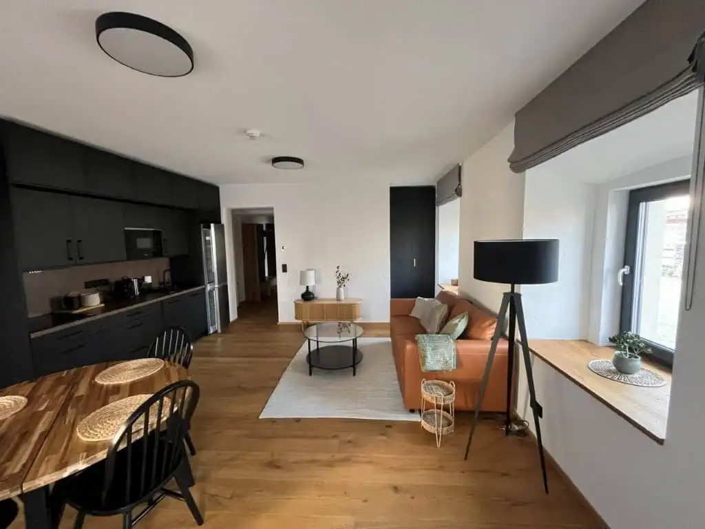 Modern interior of a luxury apartment in Rattendorf with stylish furnishings and spacious living are.