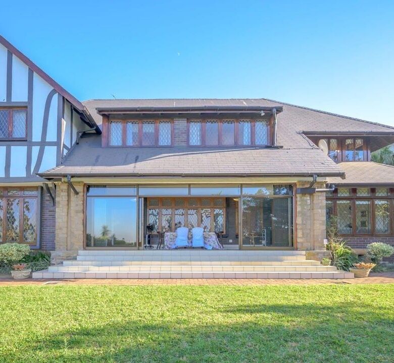 Elegant 9-bedroom estate in Durban with spacious living areas and beautiful garden views. Perfect fo.