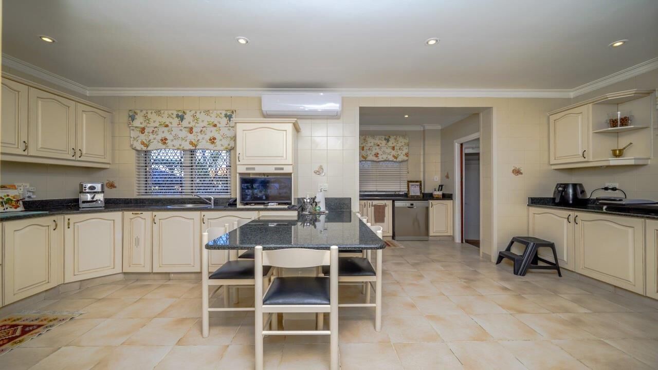 Luxury 9-Bed Estate in Durban South Spacious kitchen with modern appliances in a luxurious Durban estate. Perfect for family living and.