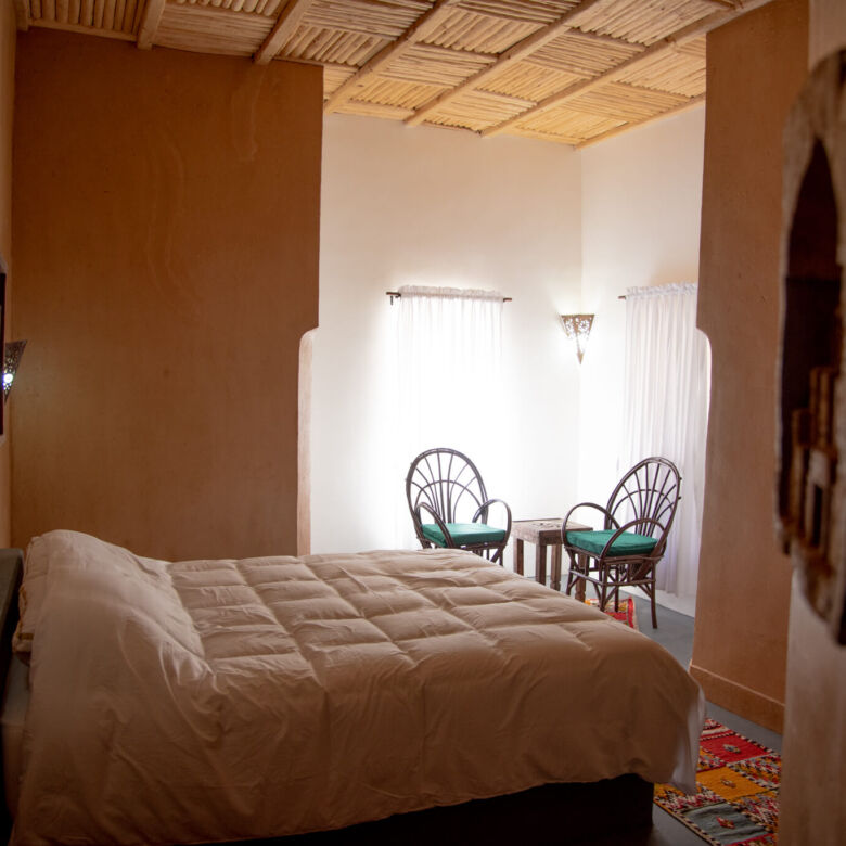 Beautiful interior of Kasbah Tiziri Hotel in Imzough, showcasing traditional Moroccan decor and cozy.