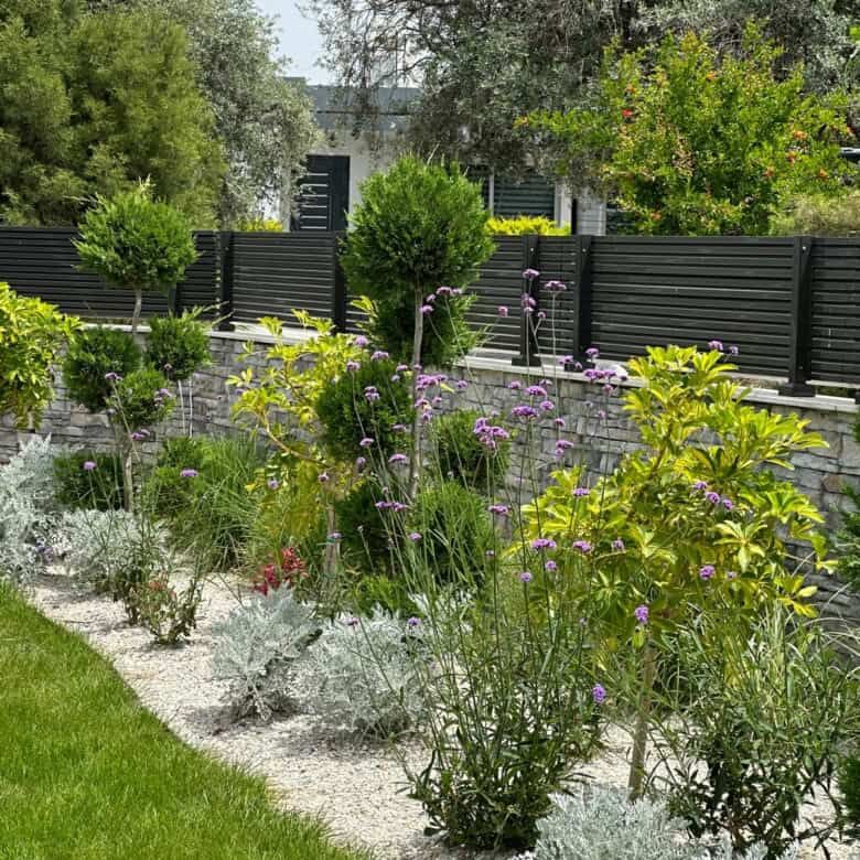 Elegant garden with lush greenery and colorful flowers in Kyrenia North.