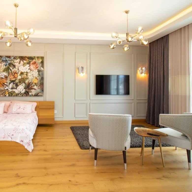 Elegant living room with modern furnishings and large windows in Kyrenia North.