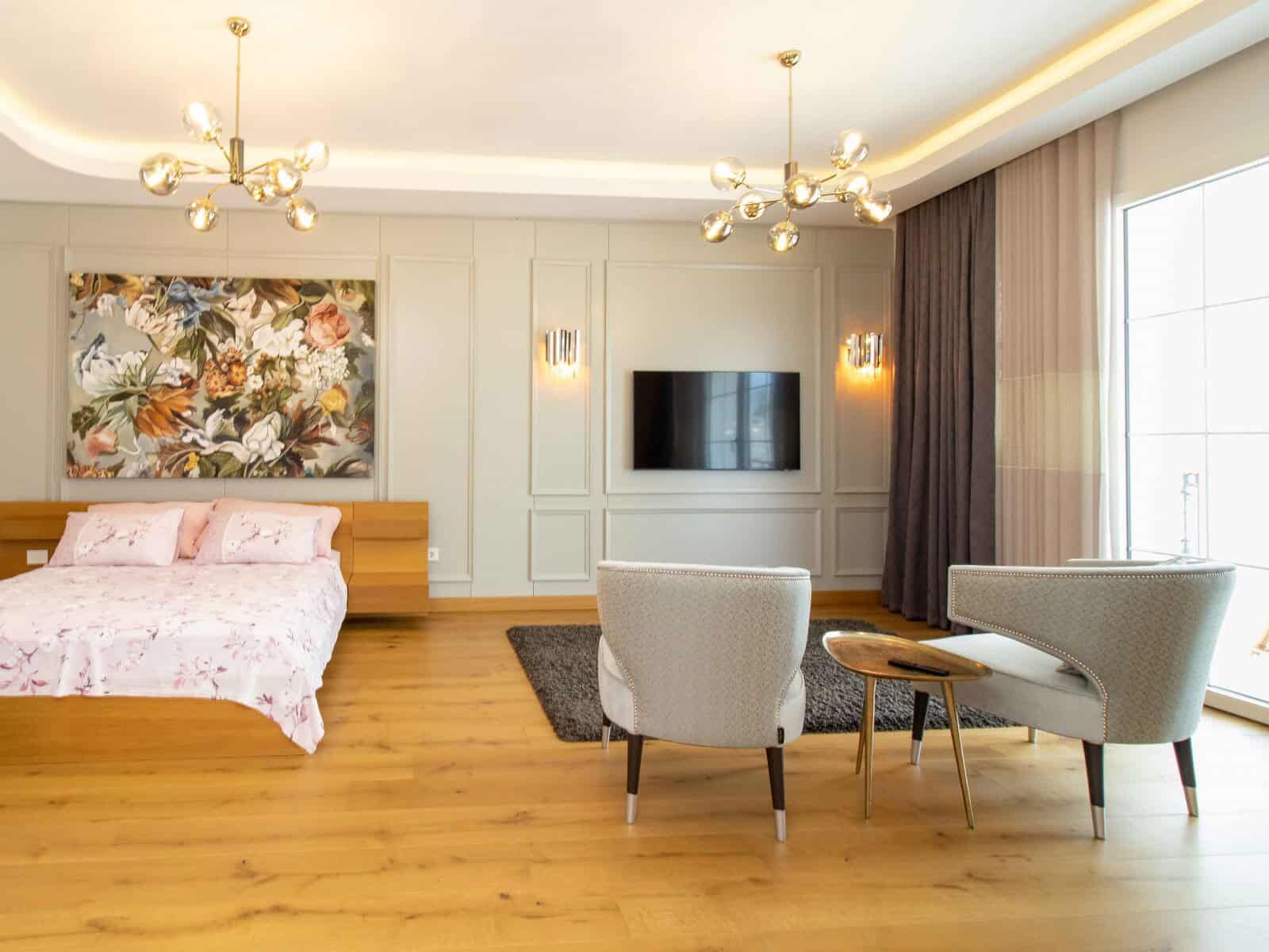 Luxury 4 Bed Villa Interior in Kyrenia North Elegant living room with modern furnishings and large windows in Kyrenia North.