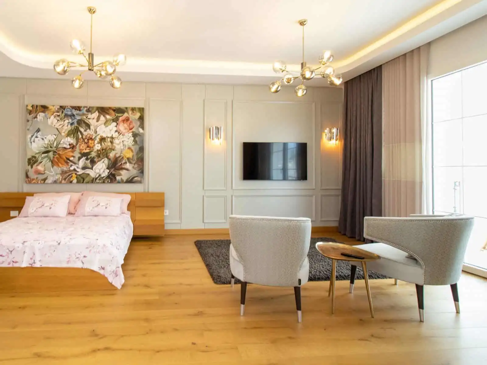 Elegant living room with modern furnishings and large windows in Kyrenia North.