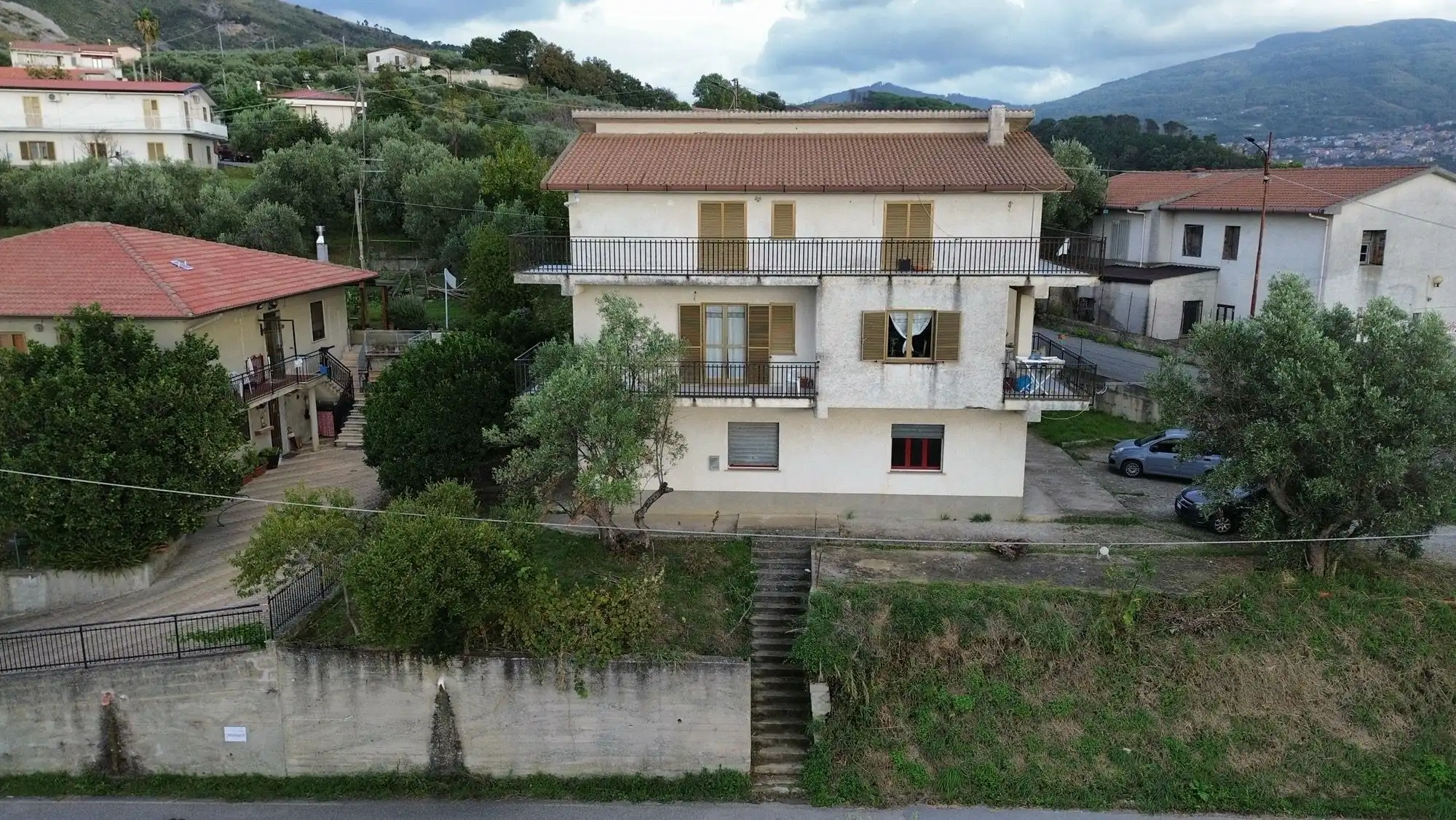 Multi-story commercial building with apartment in Cleto, Calabria, Italy.