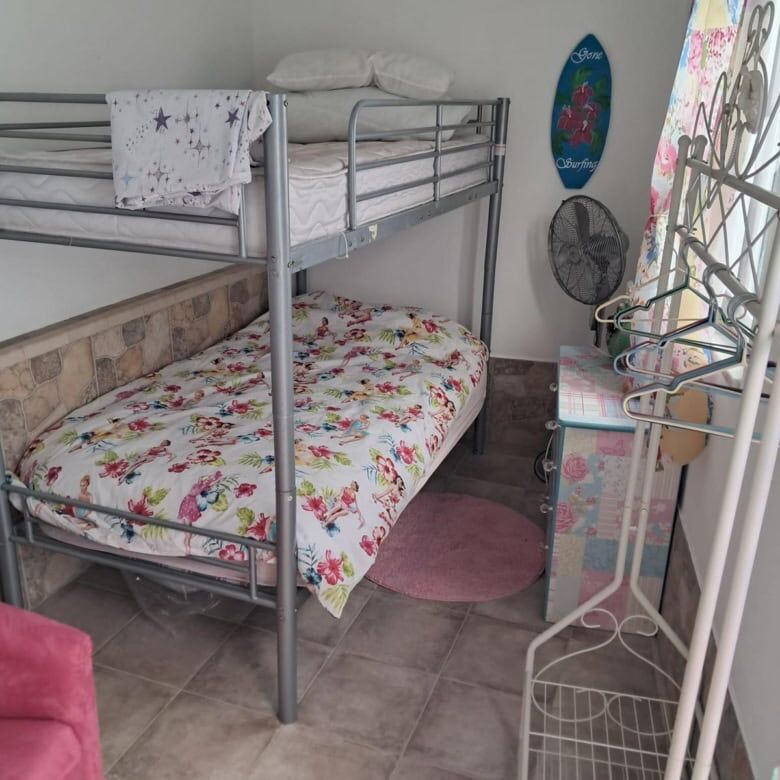 Bright bedroom with bunk beds in Castro Marim, Faro Algarve. Perfect for family stays or guests.