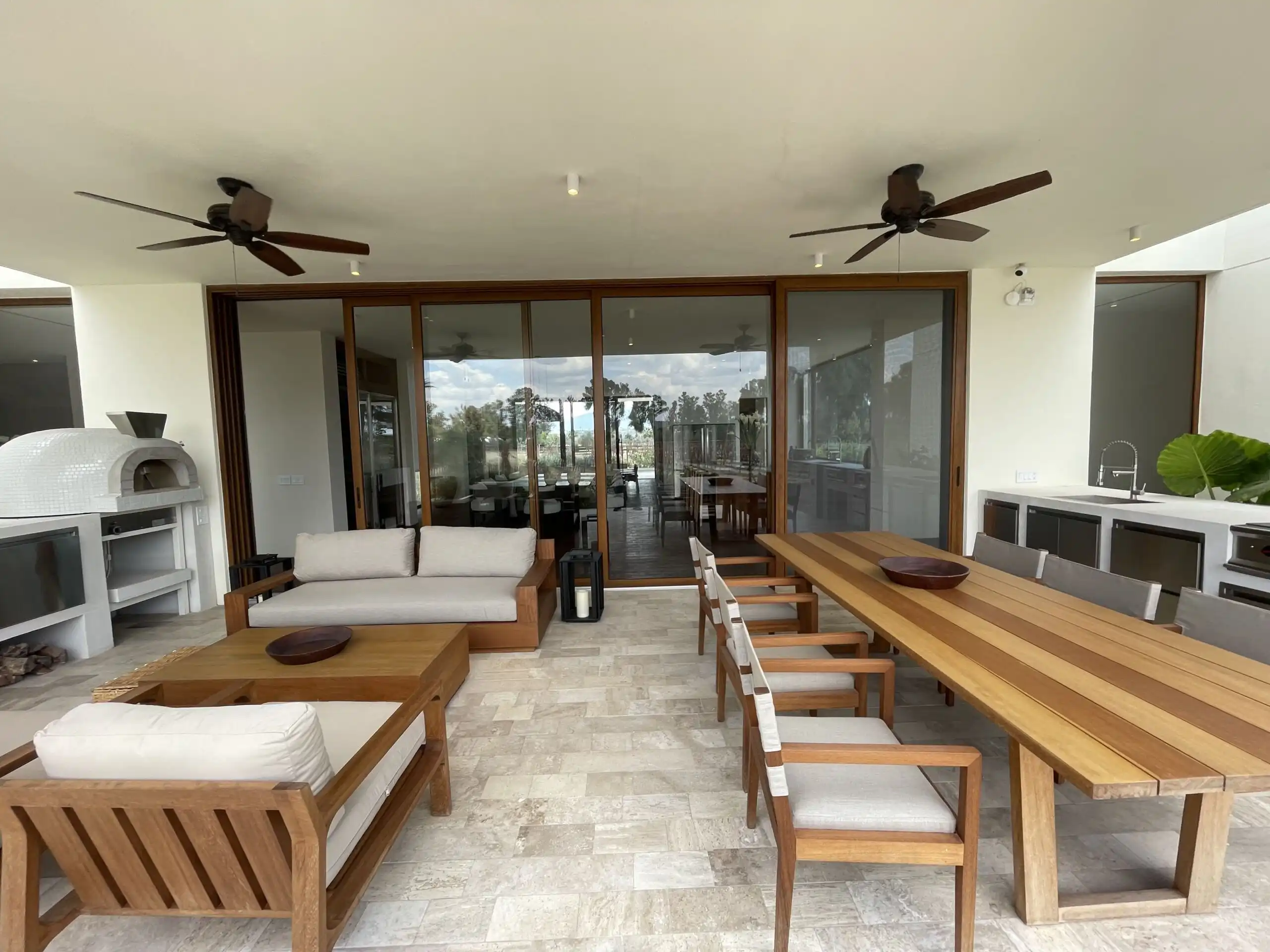 Luxury Vineyard Estate Terrace Elegant outdoor living space with modern furniture and scenic vineyard views.