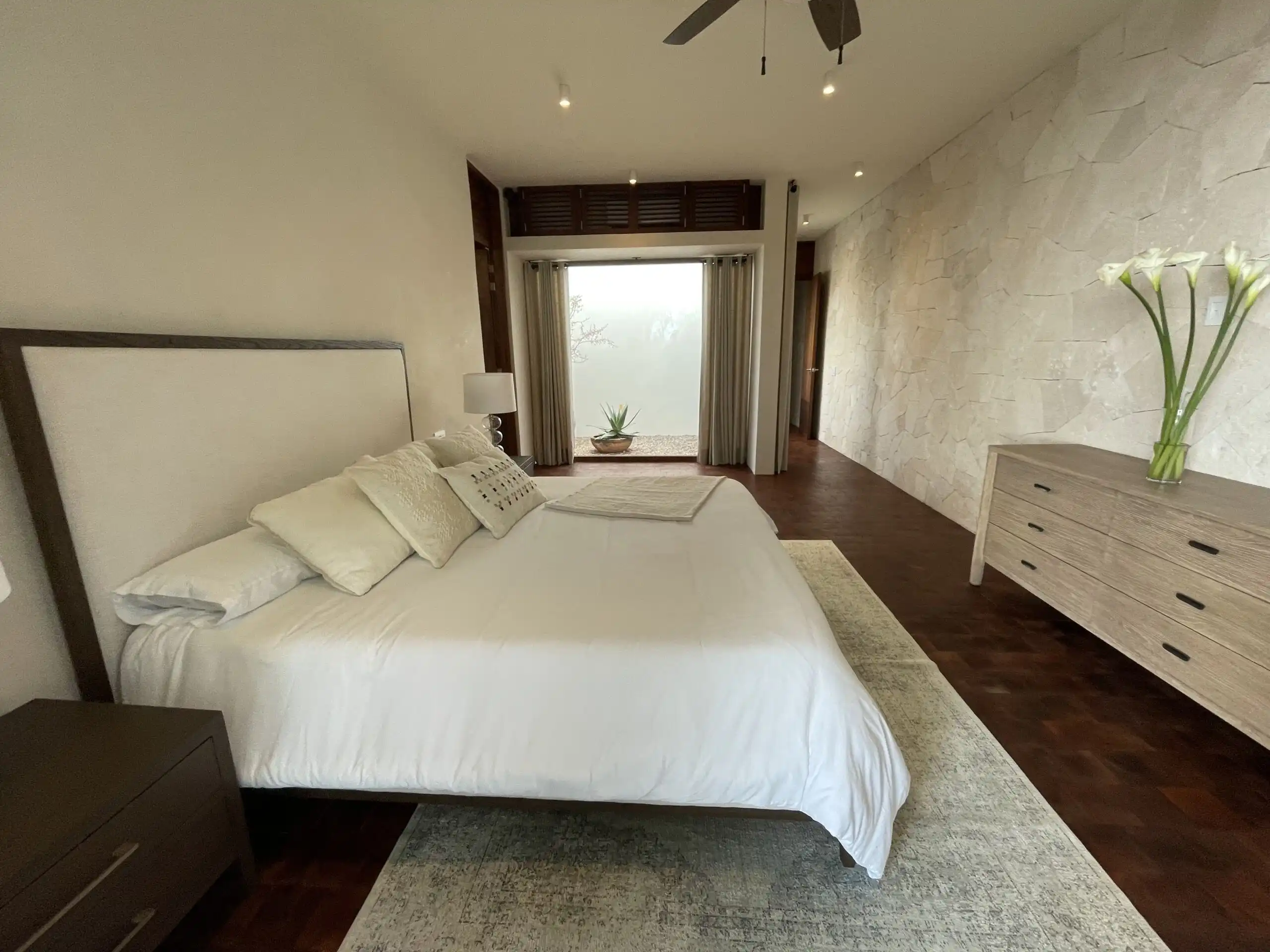 Luxury Vineyard Estate Bedroom Elegant bedroom with modern decor and scenic vineyard views in San Miguel de Allende.