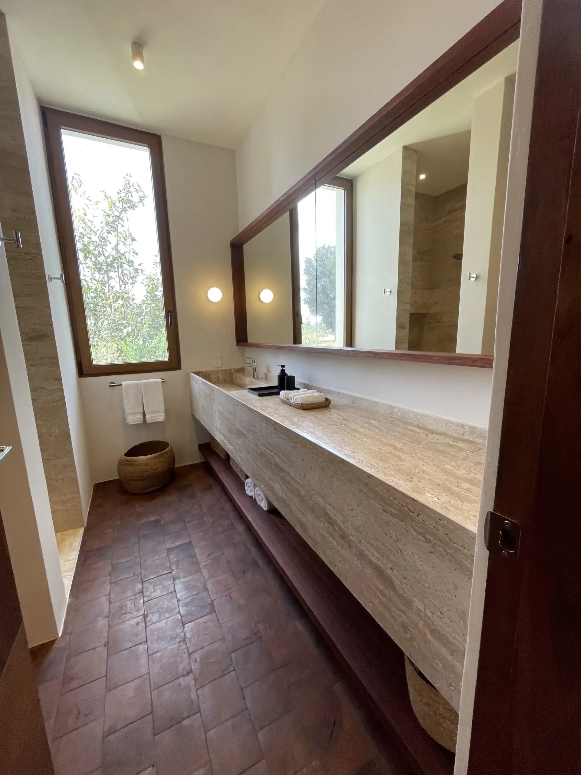 Luxury Vineyard Estate Bathroom Elegant San Miguel de Allende bathroom with modern fixtures and natural light.
