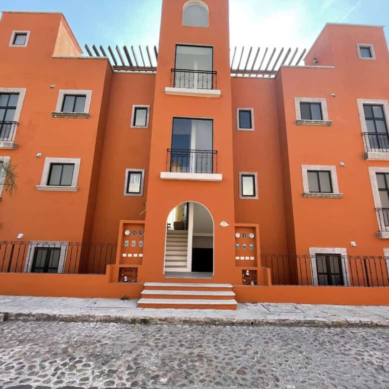Charming 2-bedroom home in San Miguel de Allende, Mexico, with vibrant exterior and modern design.