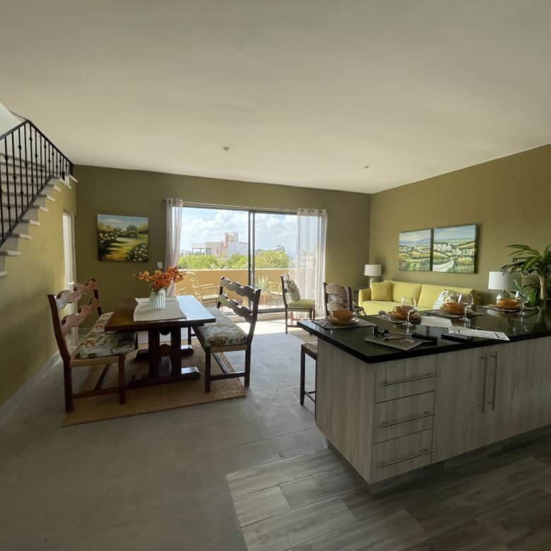 Spacious living area of a 4BR modern colonial house in La Serena SMA, Santo Domingo. Bright, airy, w.