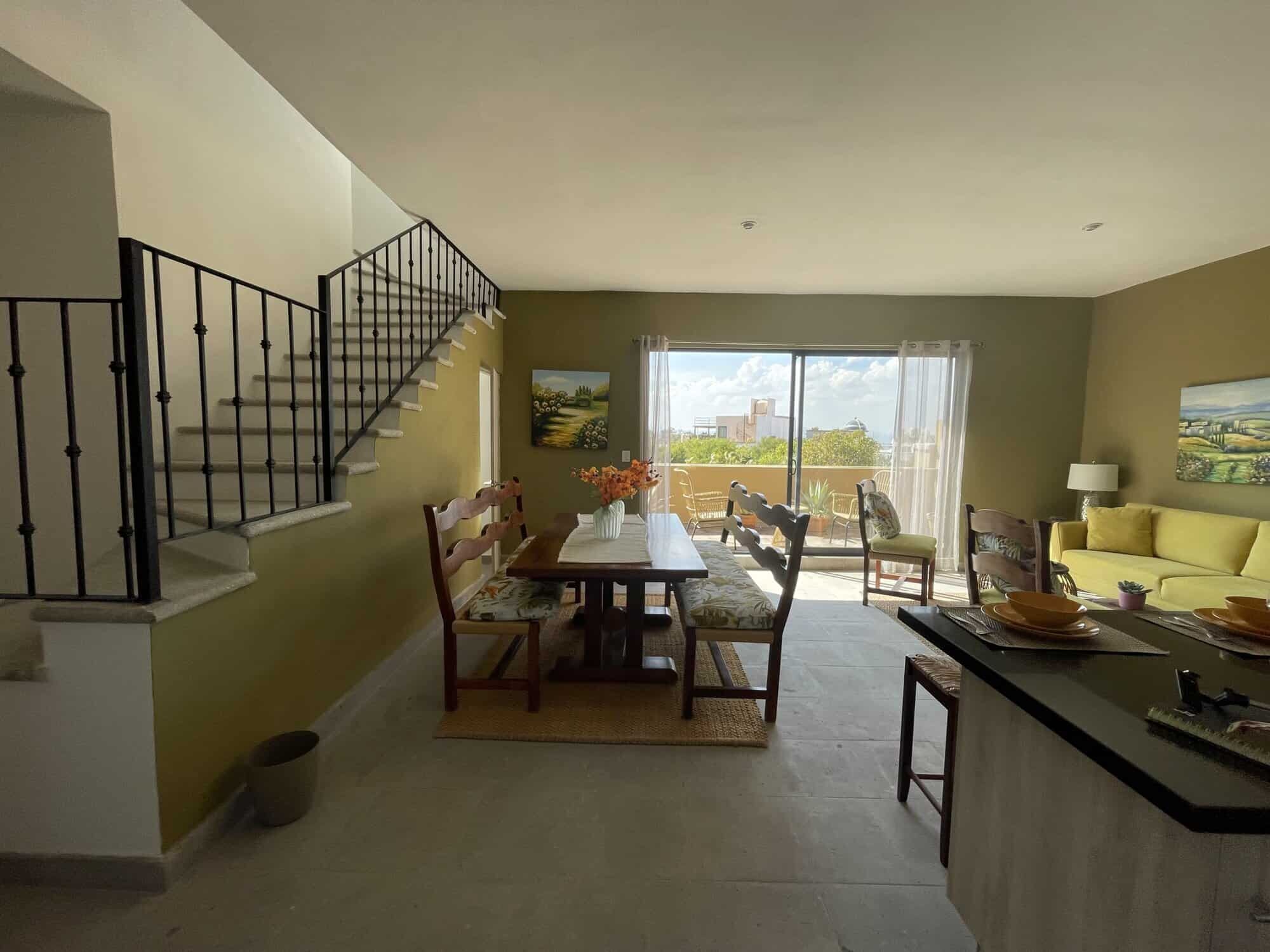 Model Santo Domingo Home Tour Interior view of a modern colonial-style living and dining area in La Serena SMA.