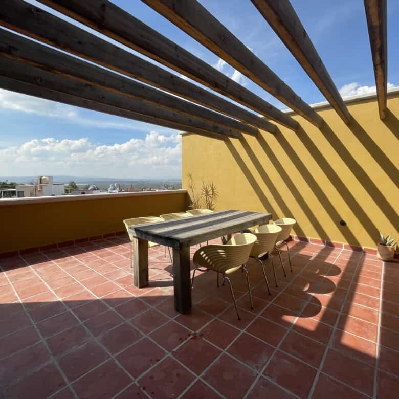 Rooftop terrace of a 4BR modern colonial house in La Serena SMA with scenic city views. Perfect for.