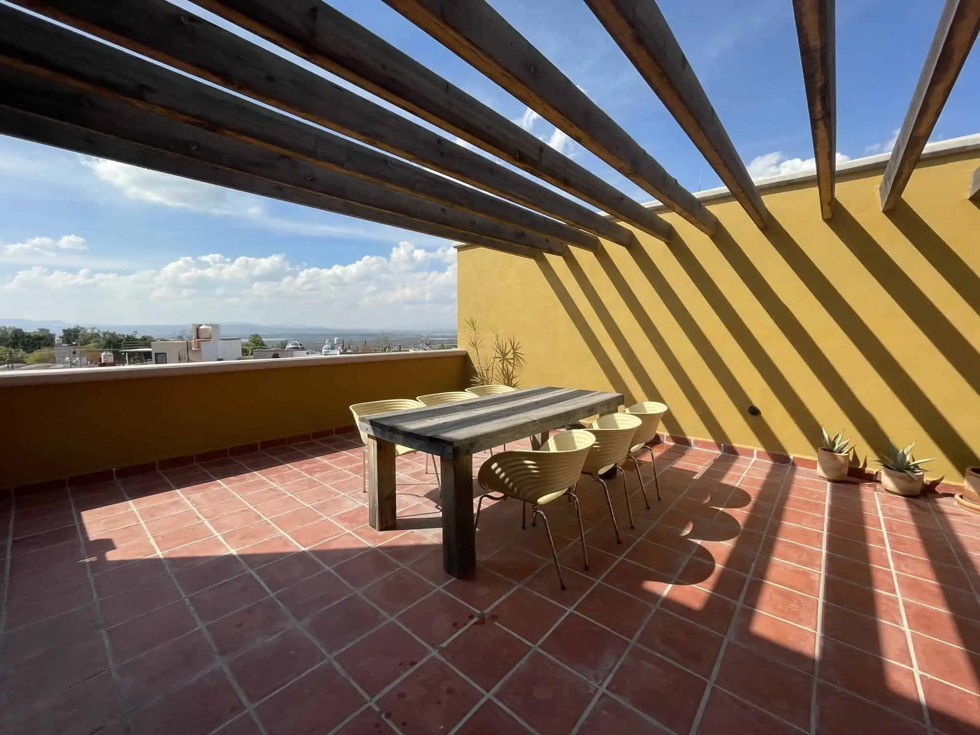 Rooftop terrace of a 4BR modern colonial house in La Serena SMA with scenic city views. Perfect for.